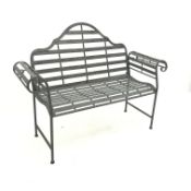 Distressed metal bench, shaped back and scrolled arms, W135cm,