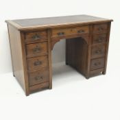 Edwardian oak twin pedestal desk, inset leather top, nine graduating drawers, stile supports,