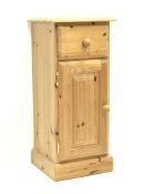 Solid pine narrow bedside lamp cabinet fitted with drawer and single cupboard, W35cm, H79cm,
