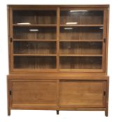 Large solid teak bookcase cabinet, top section enclosed by two glazed sliding doors,