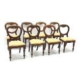 Set eight Victorian mahogany balloon back chairs, serpentine front with drop on upholstered seats,