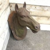 Large cast iron wall mounted figure of a horse's head, W37cm,