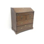 George III oak bureau, fall front enclosing fitted interior with well,