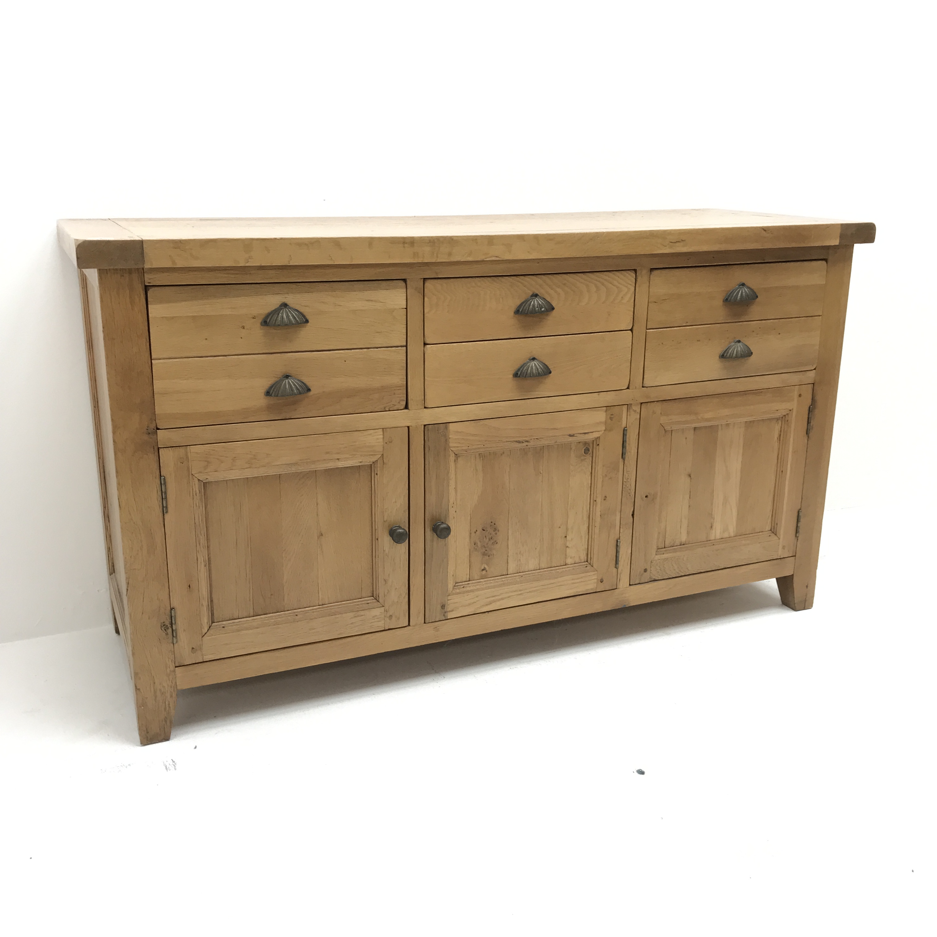 Light oak sideboard, four drawers above three cupboards, stile supports, W160cm, H91cm,