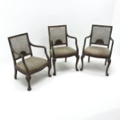 Set three early 20th century beech framed armchairs, cane work splat, upholstered seat,