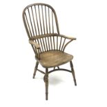 20th century elm high back Windsor armchair, turned supports joined by a crinoline stretcher,