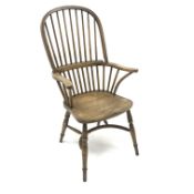 20th century elm high back Windsor armchair, turned supports joined by a crinoline stretcher,