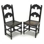 Pair 19th century oak hall chairs, detailed carved backs, solid seats,