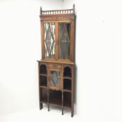 Edwardian mahogany corner cabinet, two finials and gallery cresting rail,