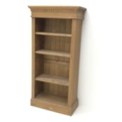 Solid pine open bookcase, dentil frieze, three adjustable shelves, plinth base, W62cm, H125cm,