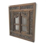 Eastern style hardwood window shutter mirror in carved fretwork frame,