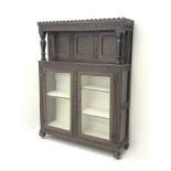 Early 20th century carved and inlaid oak court display cabinet,