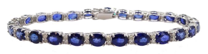 18ct white gold oval cut sapphire and round brilliant cut diamond bracelet, stamped 750, total sapp