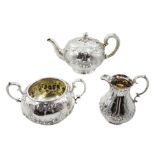 Victorian silver three piece tea service, embossed floral and swag decoration by Henry Wilkinson & C