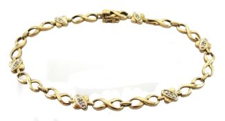 9ct gold bracelet with cross link sections each set with a diamond chip, stamped 375