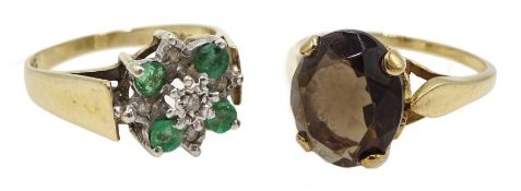 Gold emerald and diamond chip flower head cluster ring and a smoky quartz gold ring, both hallmarke