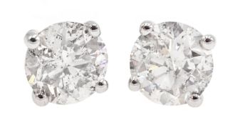 Pair of 18ct white gold round brilliant cut diamond stud earrings, hallmarked, diamond total weight