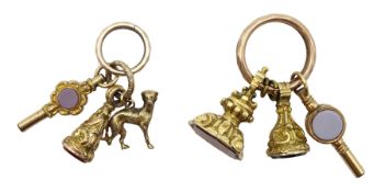 Victorian gold mounted and pinchbeck hard stone pocket watch keys, hard stone fobs and dog charm