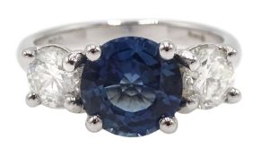 18ct white gold round sapphire and diamond three stone ring, hallmarked, sapphire approx 4.10 carat