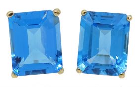 Pair of 9ct gold emerald cut Swiss blue topaz stud earrings
