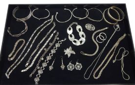 Collection of silver jewellery including bracelets, earrings, bangles, necklaces and brooch, all sta