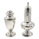 Edwardian silver sugar shaker by by Walker & Hall, Sheffield 1901 and one other by William Comyns &