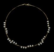 9ct gold two strand wire and cultured pearl necklace, stamped 375