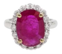 18ct white gold oval ruby and diamond cluster ring, stamped 750, ruby approx 3.80 carat, diamond to
