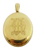 18ct gold oval hinged locket pendant, engraved initials on both sides, stamped 18 makers marks AD