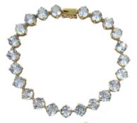 9ct gold blue topaz link bracelet, hallmarked