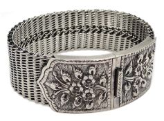 Heavy silver woven bracelet, with embossed flower design buckle, stamped 925