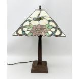A Tiffany style table lamp, with glass shade detailed with butterflies and flowers, including shade