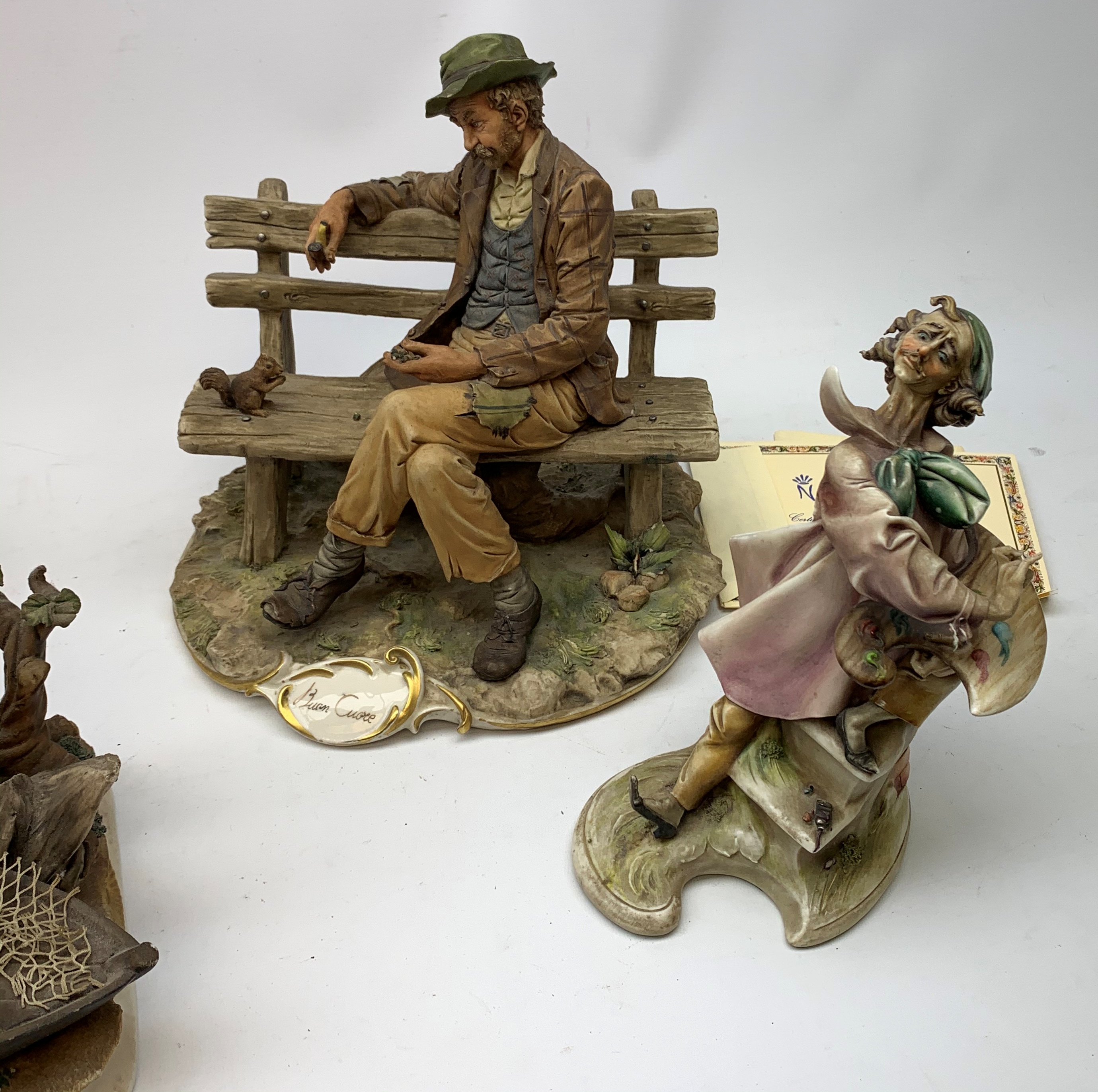 A group of four Capodimonte figurines, comprising The Fisherman, Tramp on Bench, each with accompany - Image 3 of 3