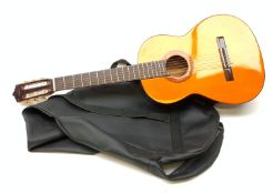 A Marina acoustic guitar, L100cm in fabric carry case.