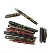 A group of Vintage pens, to include a Conway Stewart 84 lever filled fountain pen with nib marked 14