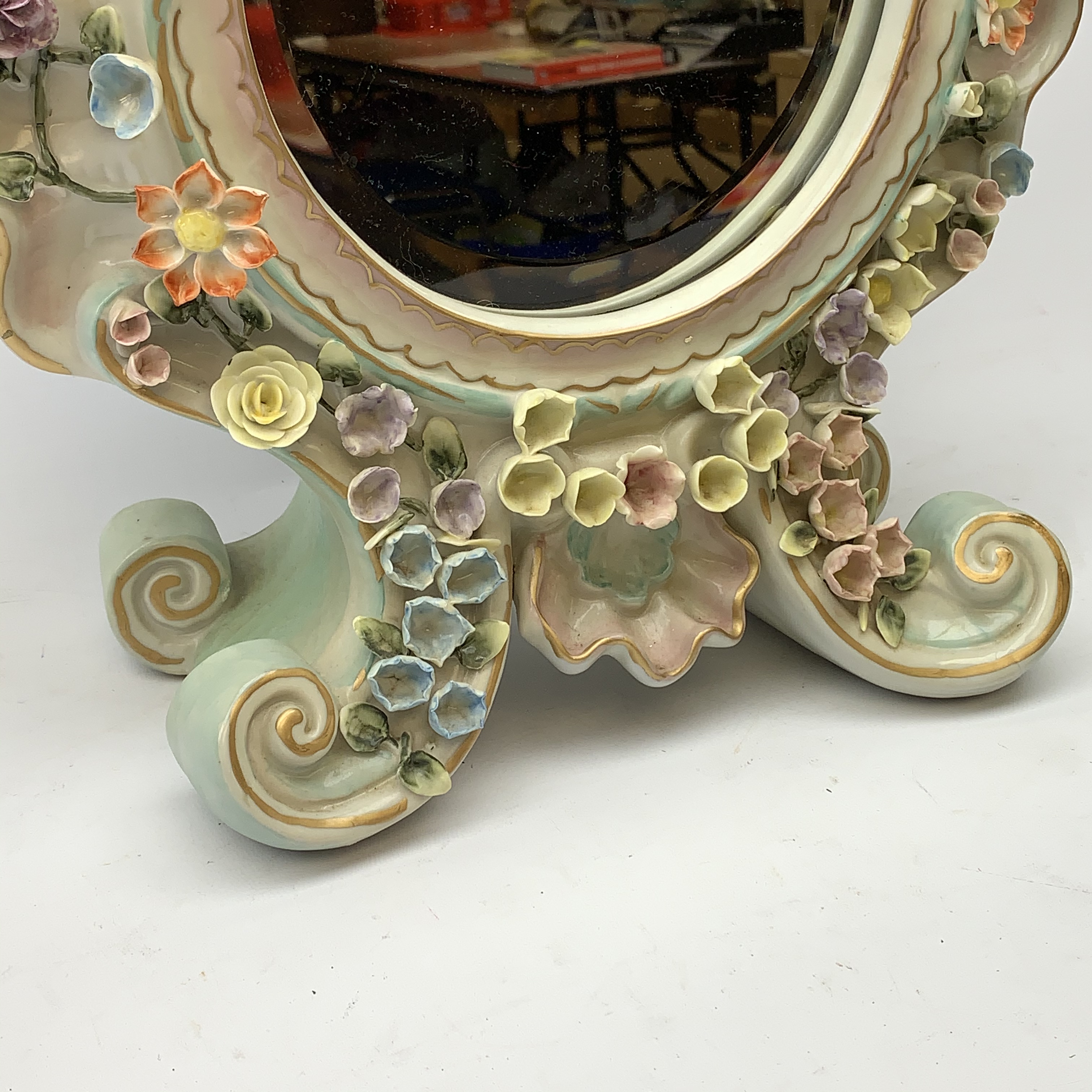 A late 19th century Sitzendorf porcelain mirror, the mirror plate of circular form set within a sha - Image 4 of 13
