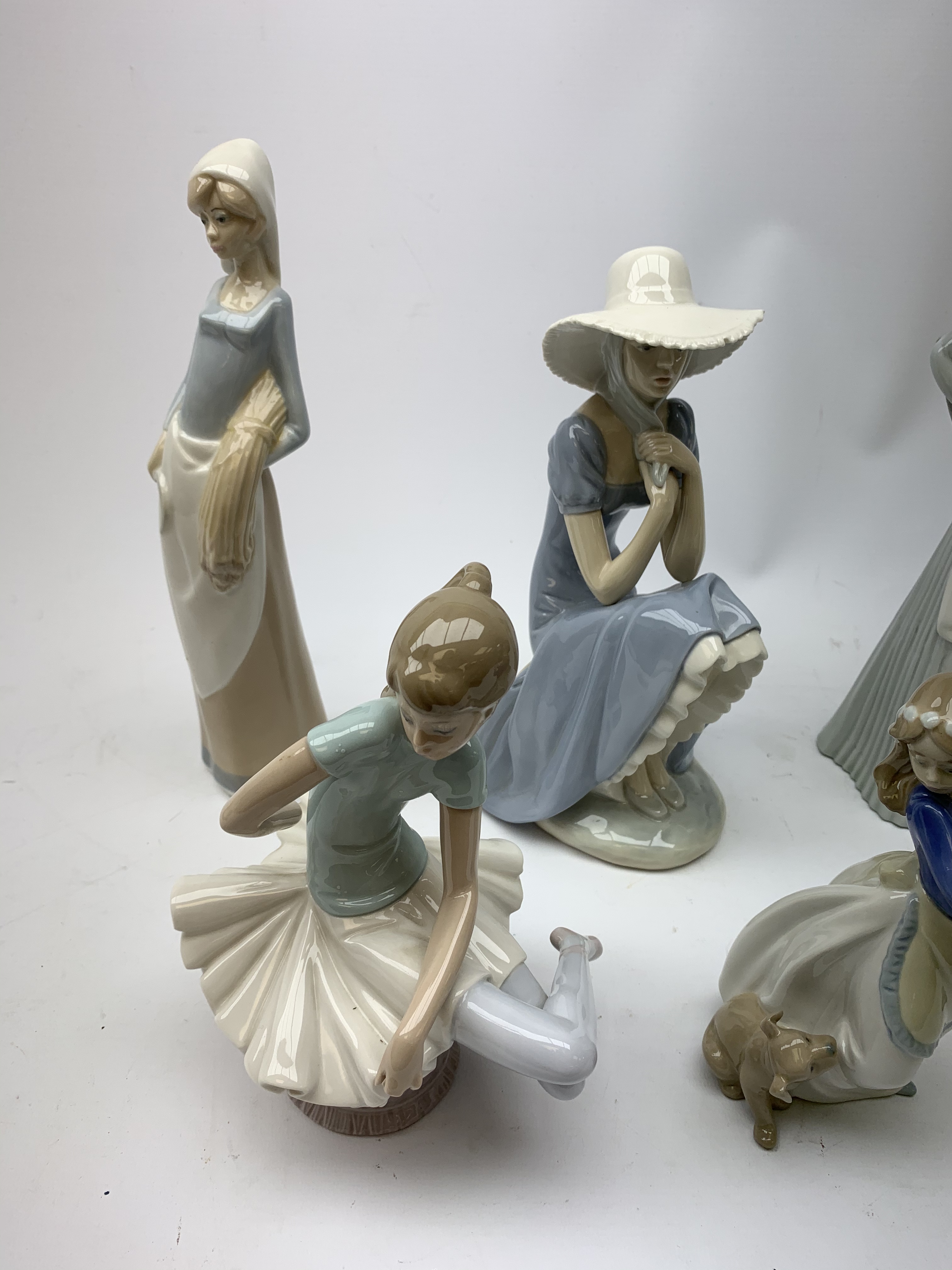 A group of Spanish figurines, to include examples bv Lladro and Nao. - Image 2 of 3