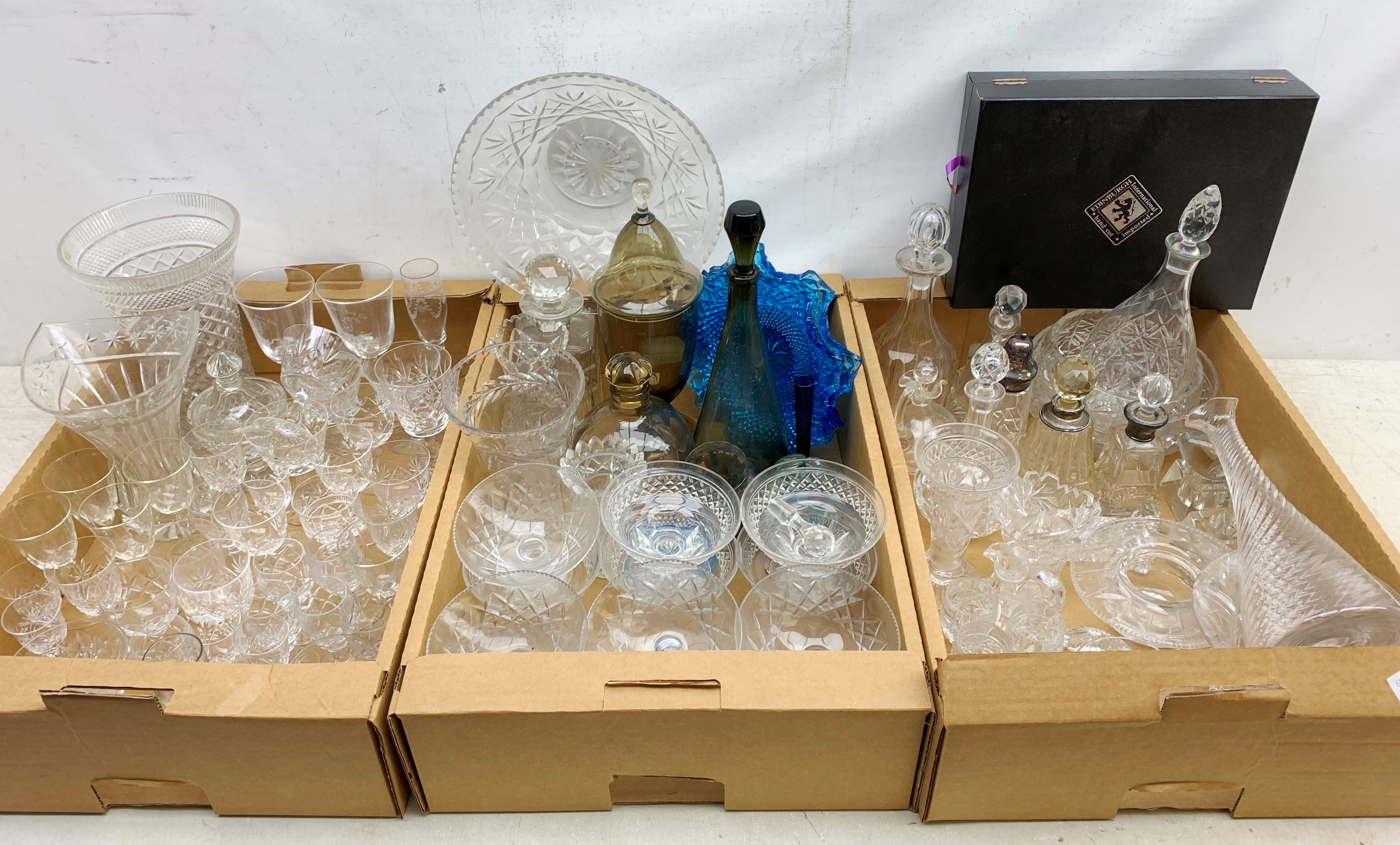 A large quantity of assorted glassware, to include Stewart drinking glasses, two silver mounted bot