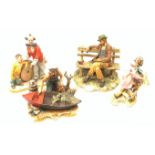 A group of four Capodimonte figurines, comprising The Fisherman, Tramp on Bench, each with accompany