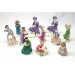 Five small Royal Doulton figurines, comprising Home Again HN2167, Carrie HN2800, Dinky Do HN1678, F