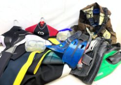 A collection of assorted sized wetsuits, comprising examples, by Osprey, Saltrock, TWF, Alder, Banan