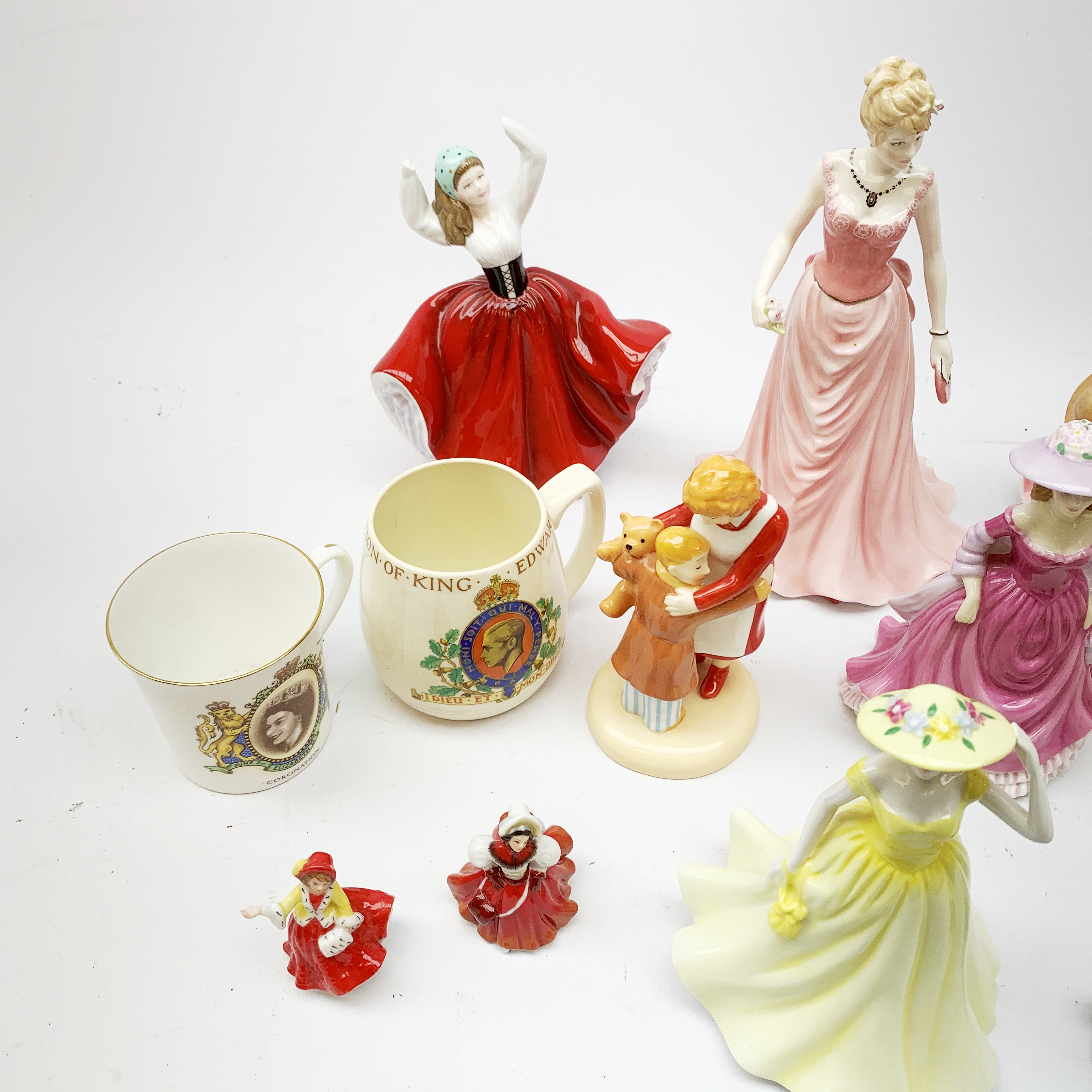 A collection of figurines, to include a selection of Royal Doulton fgurines, Autumn Stroll HN4588, - Image 2 of 3
