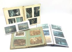 Four albums containing over three-hundred and thirty early 20th century moonlit topographical postc