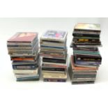 A collection of approximately seventy five CD's, to include a examples by Queen, The Jam, Ramones, U