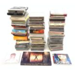 A collection of approximately eighty CD's, to include examples by Fleetwood Mac, David Bowie, Alice