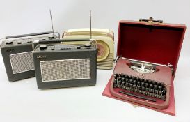 A Vintage cased Oliver typewriter, together with three vintage radios, two marked Hacker, the other