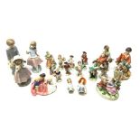A group of assorted figurines, comprising a Royal Doulton figurine The Bedtime Story Hn2059, a pair