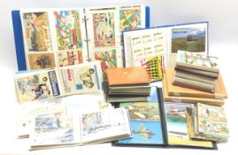 Fifteen modern albums containing over nine-hundred and fifty postcards, some early 20th century, in