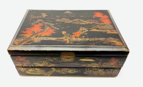 A 20th century Chinese black lacquer and gilt detailed writing box, decorated with figures, pagodas