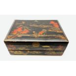 A 20th century Chinese black lacquer and gilt detailed writing box, decorated with figures, pagodas